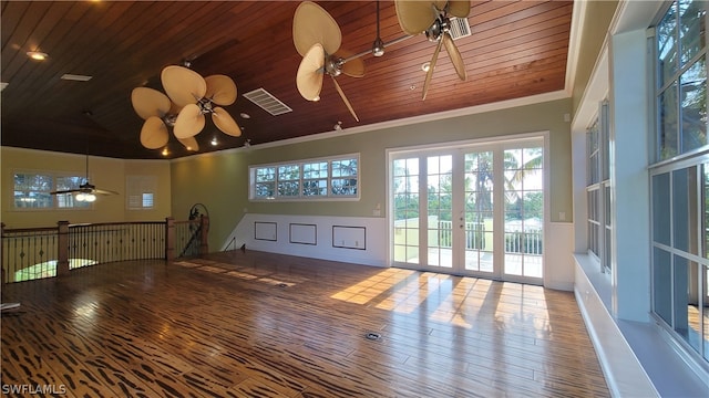 unfurnished living room featuring hardwood / wood-style flooring, french doors, wood ceiling, and ceiling fan