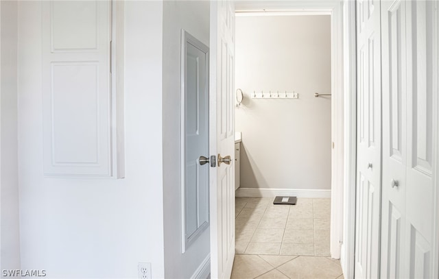 bathroom with tile patterned floors