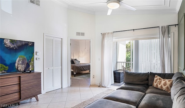 tiled living room featuring ceiling fan and vaulted ceiling