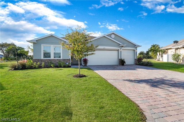 ranch-style house with a garage and a front lawn