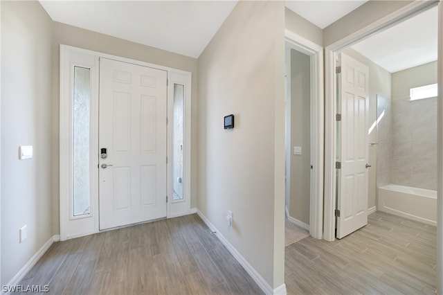 foyer featuring light wood-type flooring