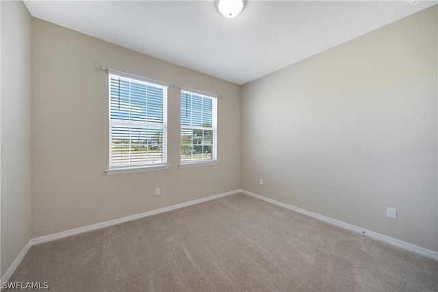 view of carpeted spare room