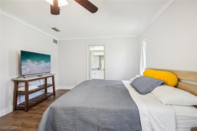 bedroom with ceiling fan, dark hardwood / wood-style flooring, crown molding, and connected bathroom