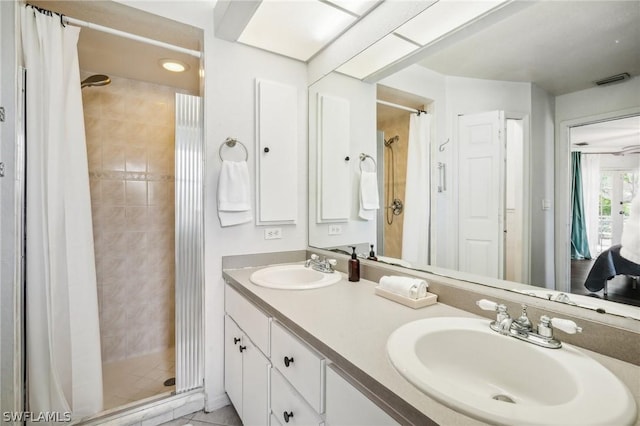 bathroom featuring vanity and walk in shower