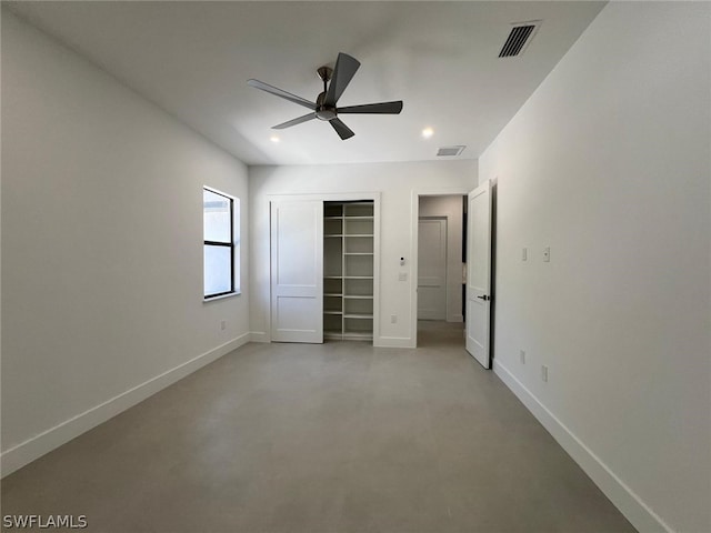 unfurnished bedroom with a closet and ceiling fan