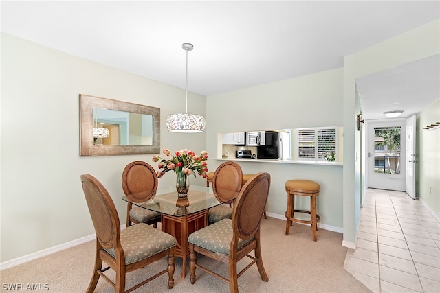 view of carpeted dining room