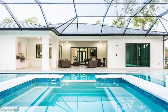 view of swimming pool featuring a lanai, area for grilling, an outdoor living space, and a patio area