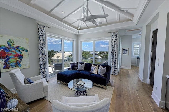 living room with beamed ceiling and hardwood / wood-style flooring