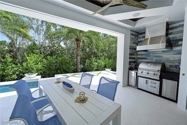 view of patio with an outdoor kitchen and area for grilling