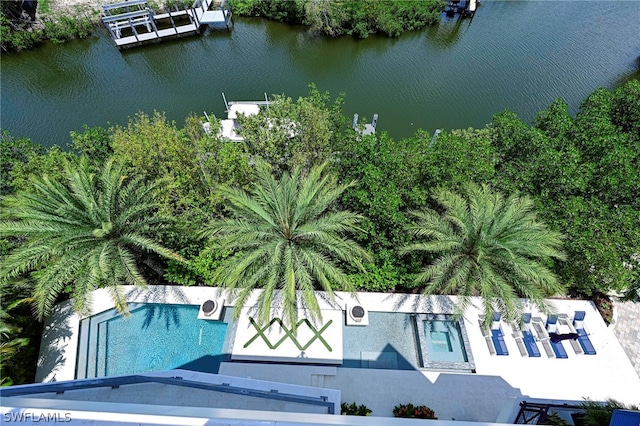 birds eye view of property featuring a water view