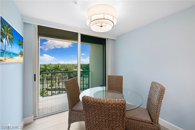 dining area with floor to ceiling windows