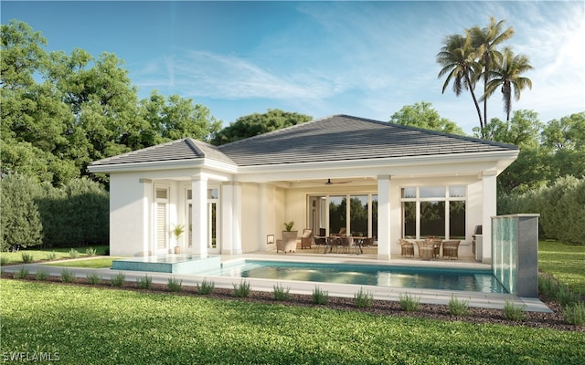 back of house featuring a patio area, a yard, and ceiling fan