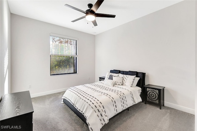 bedroom with ceiling fan and carpet floors