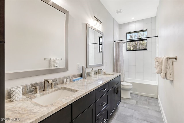 full bathroom with vanity, toilet, and shower / bath combo