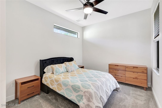 bedroom with light colored carpet and ceiling fan