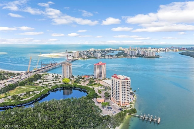 bird's eye view featuring a view of city and a water view