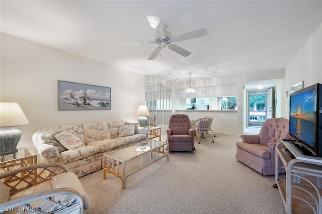 living room featuring ceiling fan and carpet floors