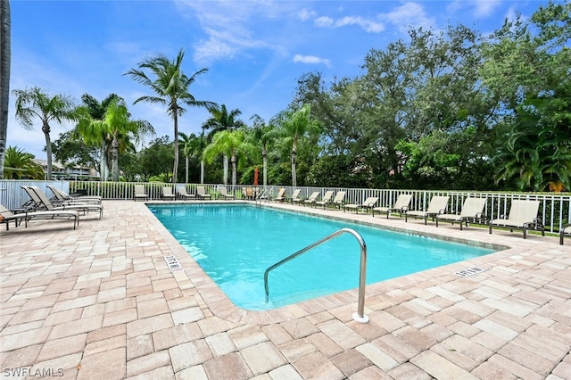 view of swimming pool featuring a patio