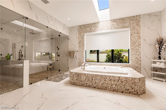 bathroom featuring tile walls, tile floors, plus walk in shower, and a skylight