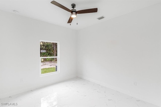 empty room featuring ceiling fan