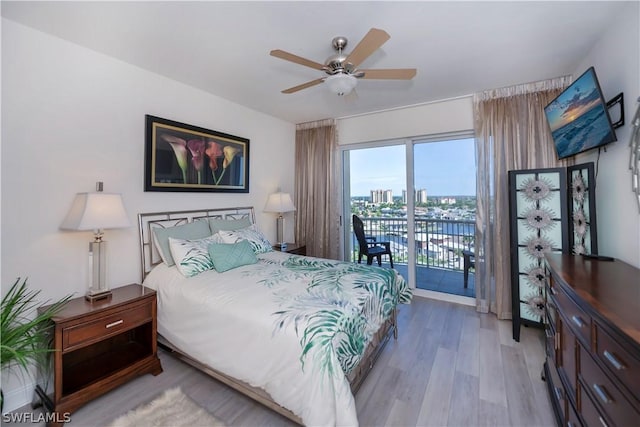 bedroom with access to exterior, ceiling fan, and light hardwood / wood-style floors