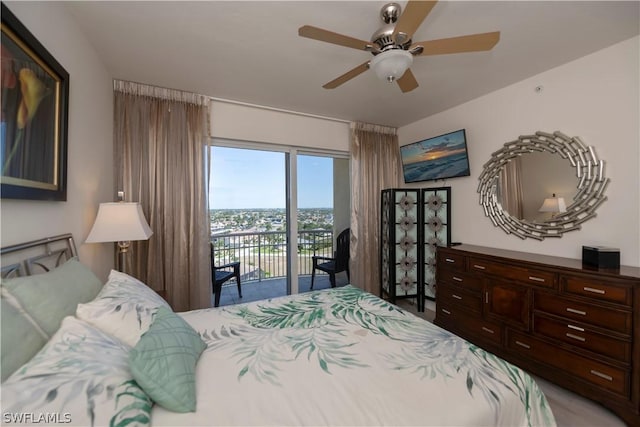 bedroom featuring a ceiling fan and access to outside