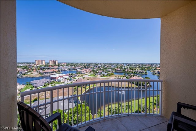 balcony featuring a water view