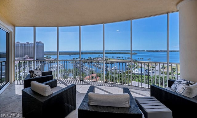 sunroom with a water view