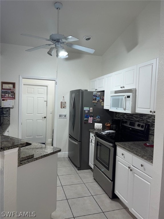 kitchen featuring appliances with stainless steel finishes, white cabinetry, ceiling fan, and light tile floors