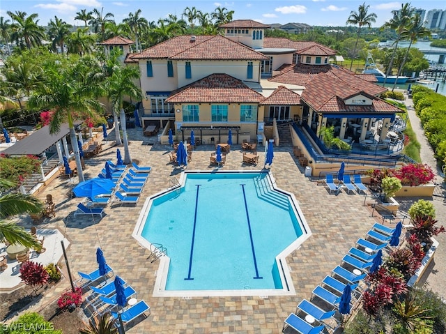 view of swimming pool featuring a patio