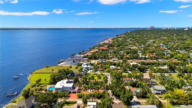 drone / aerial view with a water view