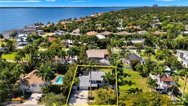 bird's eye view with a residential view and a water view