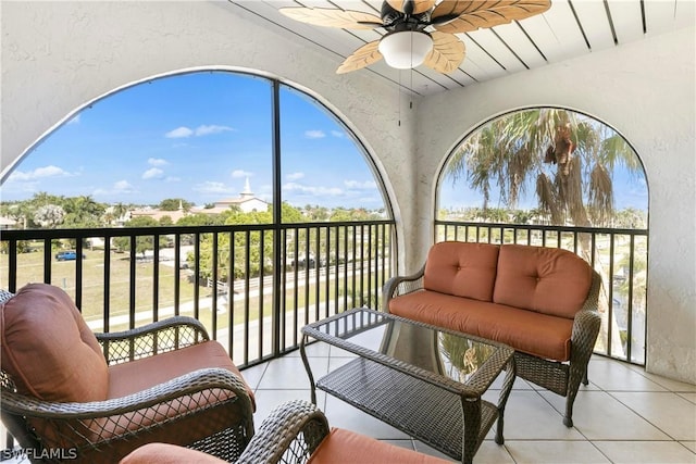 balcony featuring an outdoor hangout area and a ceiling fan