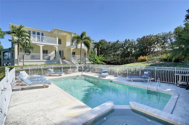 view of pool with a patio area