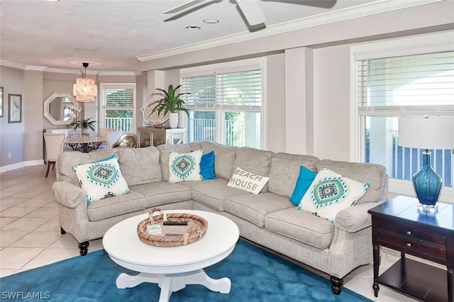 living room featuring tile patterned floors, crown molding, and ceiling fan