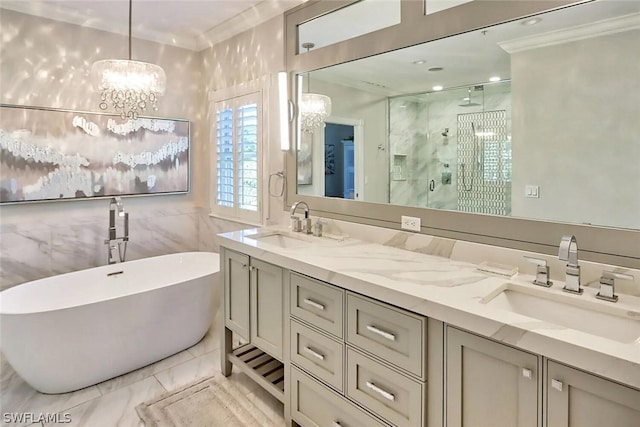 15891 Captiva Dr, Captiva, FL 33924 - bathroom with a stall shower, double vanity, a sink, and an inviting chandelier