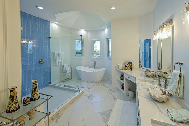 bathroom with tile floors, plus walk in shower, and double sink vanity