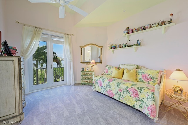 bedroom with ceiling fan, french doors, high vaulted ceiling, carpet, and access to exterior