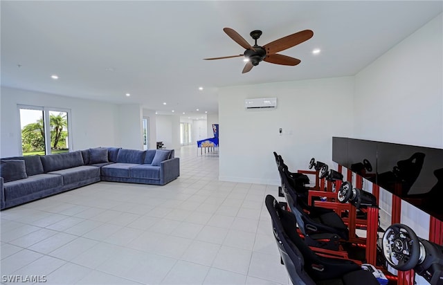 living room featuring a wall unit AC, ceiling fan, and light tile floors