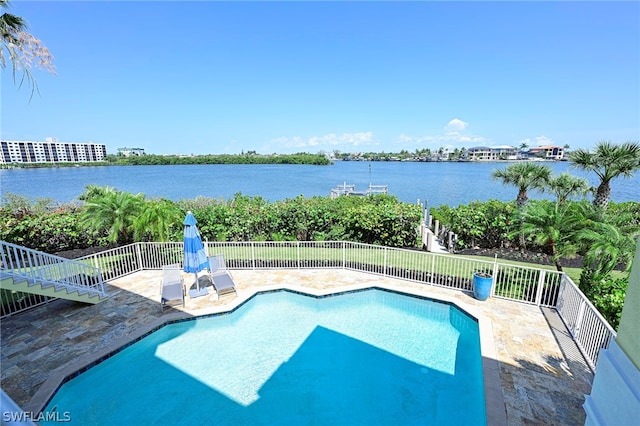 view of swimming pool featuring a patio area