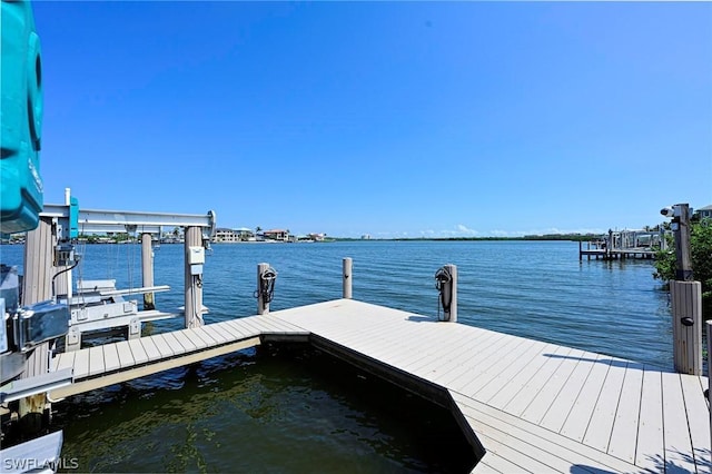 dock area featuring a water view