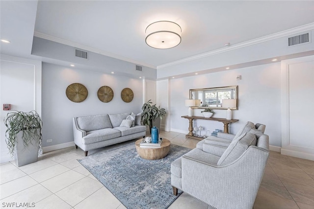 living room with crown molding and light tile floors