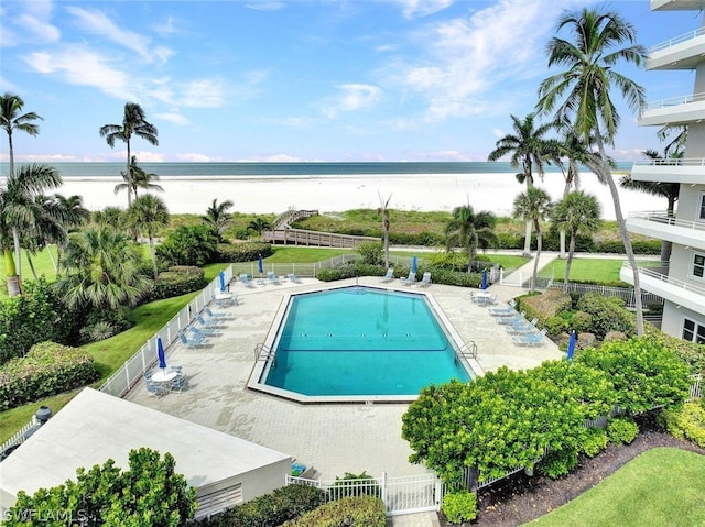 view of pool featuring a water view