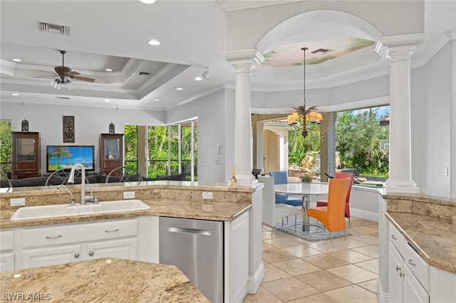 15401 Old Wedgewood Ct, Fort Myers, FL 33908 - kitchen with white cabinets, sink, a raised ceiling, and dishwasher