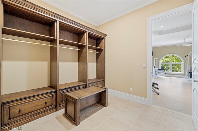 mudroom with light carpet, ornamental molding, and ceiling fan