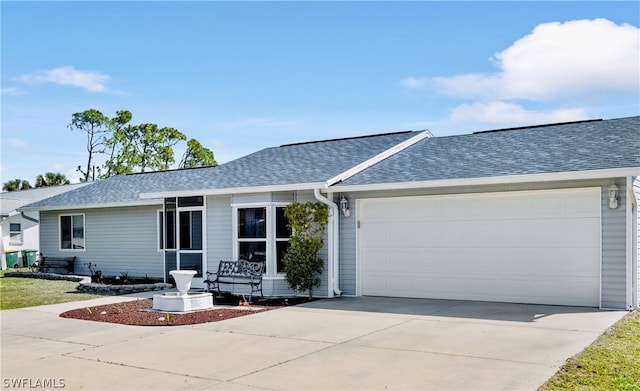 ranch-style home featuring a garage