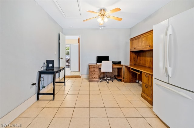 office space with ceiling fan and light tile flooring