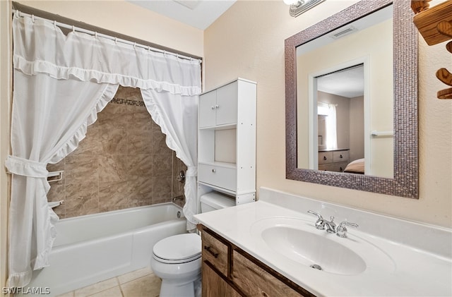 full bathroom featuring tile flooring, shower / bath combination with curtain, vanity, and toilet