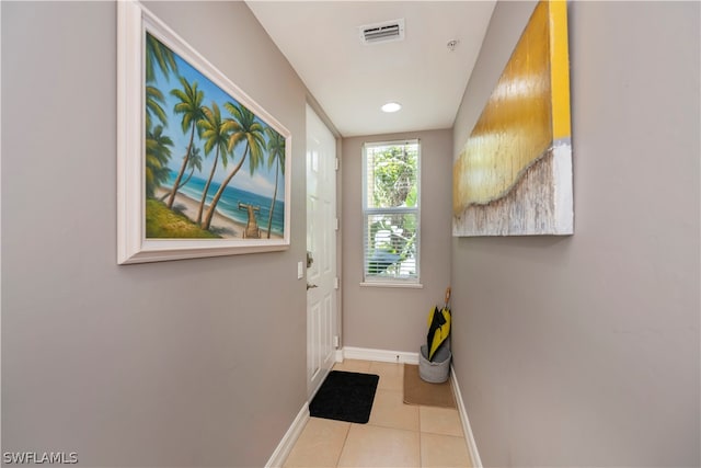 doorway featuring tile floors