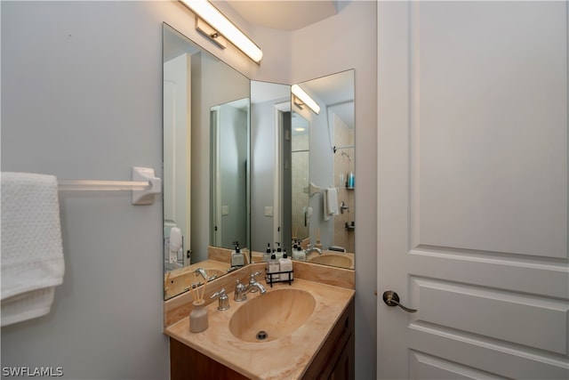 bathroom featuring vanity with extensive cabinet space